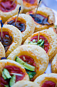 Close up of assorted mini pizzas