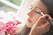 Teenage Girl Having Eyeshadow Applied