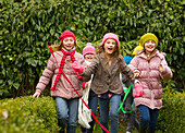 Young Girls Running in Park