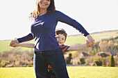 Mother and Son Playing Outdoors