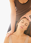 Woman Receiving a Thai Yoga Massage