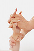 Woman Receiving Reflexology Treatment, Close-up View