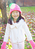 Smiling Young Girl In Park