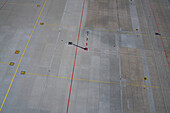 High angle view light and lines on airport tarmac