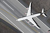 View from above airplane on airport runway