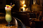 Cosy bar atmosphere with refreshing cocktail drink