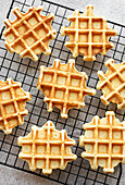 Freshly baked waffles on a baking tray