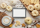 Autumnal composition. Cosy atmosphere at home. Photo frame