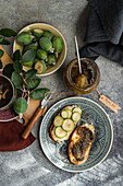 Floral tea with fresh feijoa jam sandwiches and ripe fruit