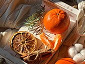 Cosy scene with fresh mandarins and warm knitted textures
