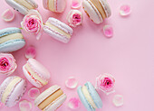 Delicious macaroons with beautiful roses