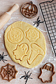 Preparing festive biscuits for baking in the oven