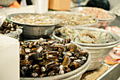 Fresh seafood in market trays in El Salvador