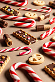 Assorted Christmas sweets and candy on a festive backdrop