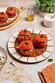 Oven-roasted stuffed tomatoes with brown rice and nuts