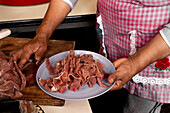 Preparation of marinated meat for Mexican dishes in La Marquesa