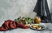 Floral tea and sandwiches with fresh feijoa fruits and jam