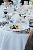 Elegant wedding dining setup with chef's plate presentation