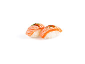 Delicious flamed salmon sushi nigiri on white background