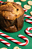 Traditional Christmas sweets: Panettone, candy canes, and butter cookies