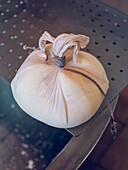 Mahon cheese wrapped in traditional cloth