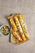 Sour snack rolls with tomato, sauerkraut and feta dip