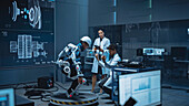 Engineers working on powered exoskeleton prototype