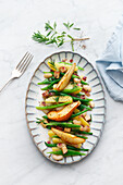Potato and bean salad with pears and bacon