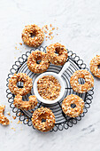 Wholemeal apple donuts coated in muesli