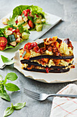 Vegan aubergine lasagne with summer salad