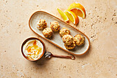Oatmeal apple balls with orange yoghurt dip