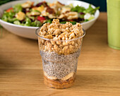 Chia pudding with peanut butter, banana and granola