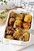 Hasselback potatoes with thyme and garlic