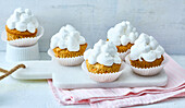 Carrot cupcakes with vegan whipped cream