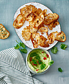 Bread chips with avocado dip
