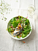 Wild herb salad with blue cheese and nuts