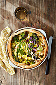 Colourful cabbage puff pastry quiche with parmesan