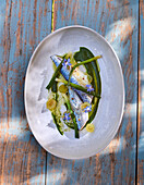 Mackerel fillets with spring onions, grapes and verjus dressing