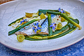 Mackerel fillets with spring onions, grapes and verjus dressing