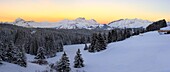 France, Savoie, Beaufortain massif, panoramic view of the sunrise over the Aravis massif from the Col des Saisies