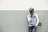 South Africa, Western Cape, Street scene with a boy in the Muslim neighborhood of Bo-Kaap in downtown Cape Town