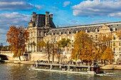 France, Paris, area listed as World Heritage by UNESCO, the banks of Seine river in autumn , the Louvre museum