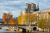 France, Paris, area listed as World Heritage by UNESCO, the banks of Seine river in autumn , the Louvre