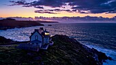 France, Finistere, Bay of Douarnenez, Cap Sizun, Pointe du Millier, The Millier lighthouse at dusk, Great National Location (aerial view)