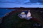 France, Finistere, Bay of Douarnenez, Cap Sizun, Pointe du Millier, The Millier lighthouse at dusk, Great National Location (aerial view)