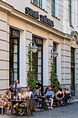 Slovakia, Bratislava, terrace of a cafe in the main street