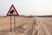 Namibia, Kunene province, Twyfelfontein, road sign on a gravel road