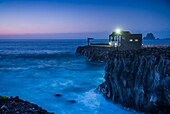 Spain, Canary Islands, El Hierro Island, Las Puntas, Hotel Puntagrande, listed in the Guinness Book of World Records as the smallest hotel in the world, dusk