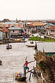 Benin, lakeside city of Ganvié, street vendor downtown