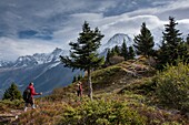 France, Haute Savoie, Mont Blanc Massif, Chamonix Mont Blanc, les Houches, two hikers on a hike to the head of the Prariond and the Aiguille du Gouter